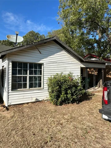 a view of a house with a garage