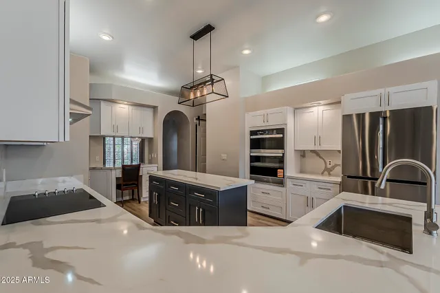 a view of a sink and a mirror