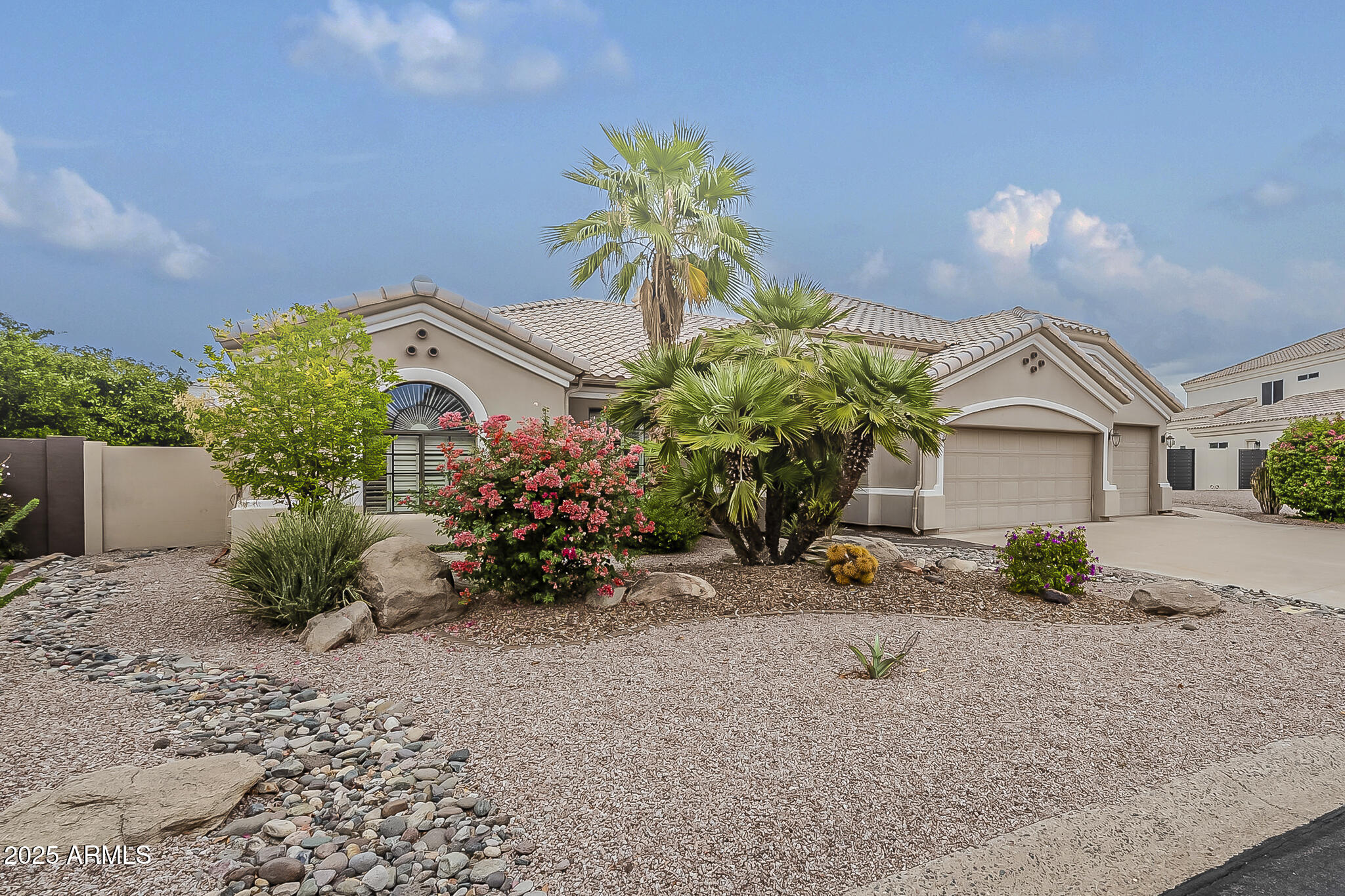 5345 East McLellan Road, Unit 112 Mesa, AZ 85205 - Photo 3 of 74 a front view of a house with a yard