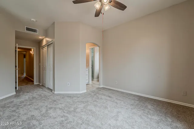 a bathroom with a shower and a sink