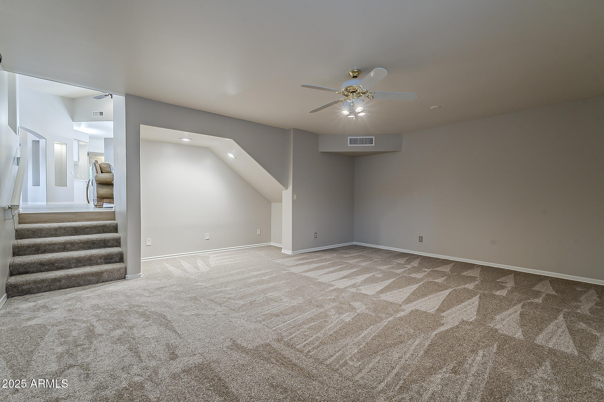 5345 East McLellan Road, Unit 112 Mesa, AZ 85205 - Photo 47 of 74 a view of an empty room and a ceiling fan