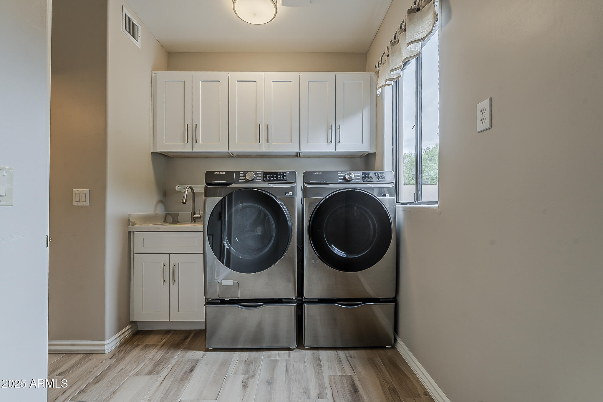 5345 East McLellan Road, Unit 112 Mesa, AZ 85205 - Photo 67 of 74 a hallway with washer and dryer