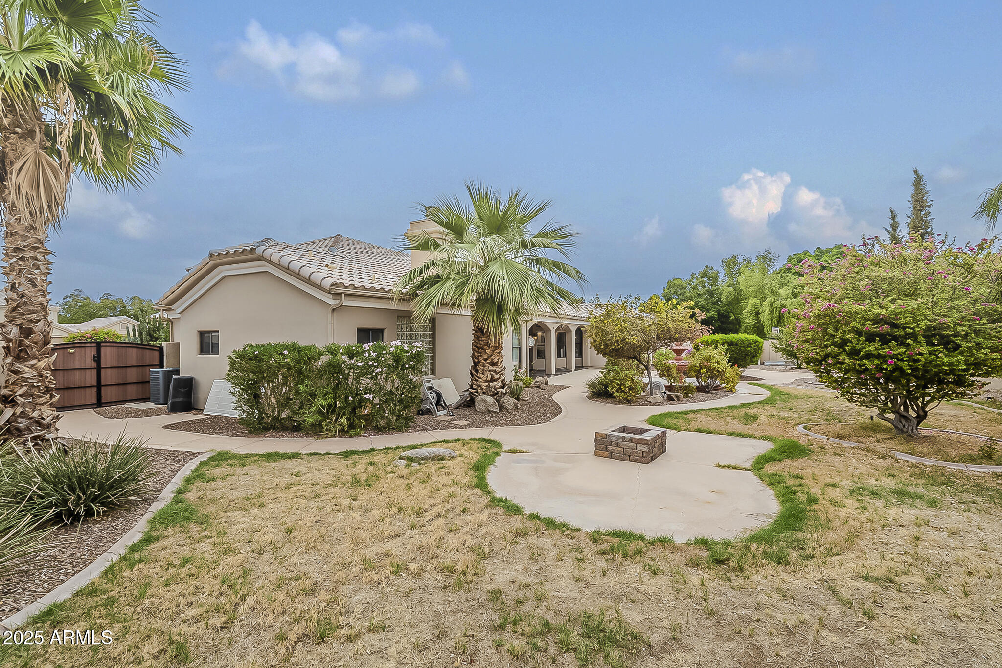 5345 East McLellan Road, Unit 112 Mesa, AZ 85205 - Photo 73 of 74 a view of a house with a yard