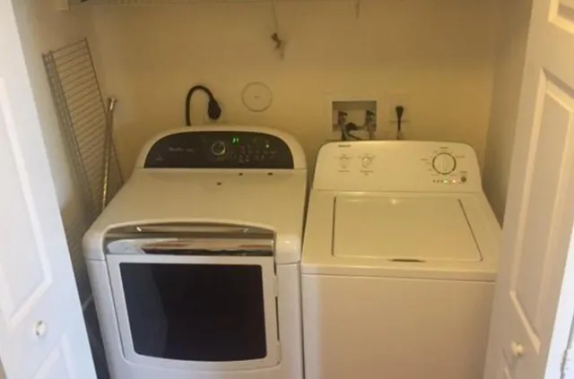 a swimming pool with outdoor seating and yard