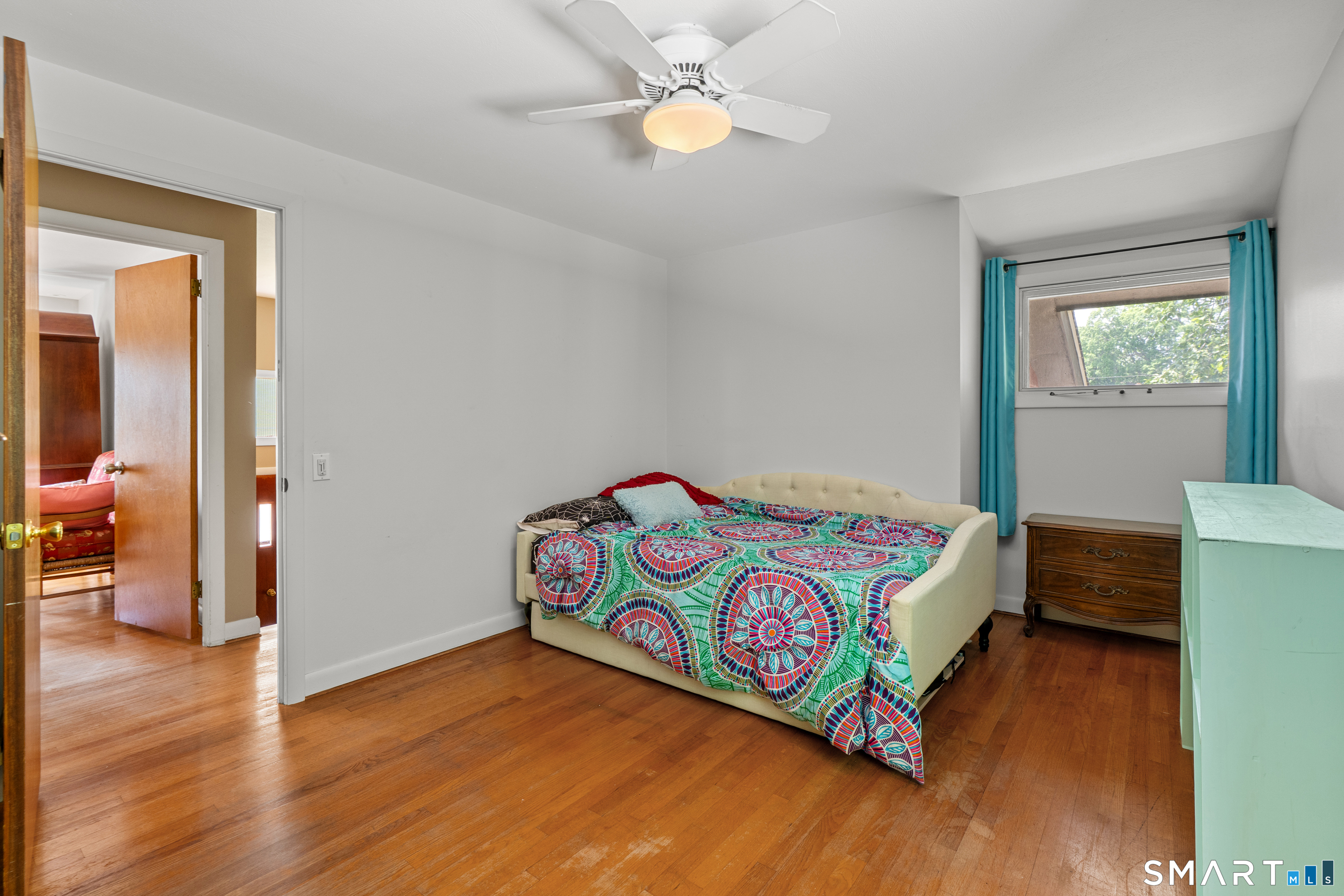 107 Round Hill Road Wethersfield, CT 06109 - Photo 25 of 40 a bedroom with bed and window