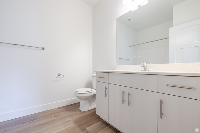 693 West 4500th South, Unit O303 Mapleton, UT 84664 - Photo 6 of 15 Full bath with vanity, light wood-style flooring, and a shower