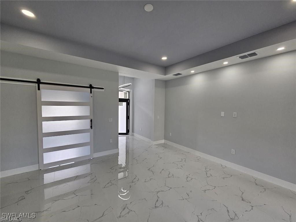 417 Progress Avenue Lehigh Acres, FL 33974 - Photo 12 of 25 a view of an empty room