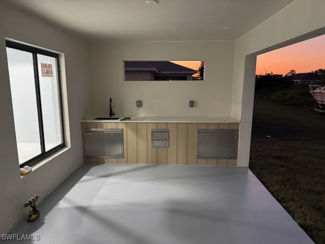 417 Progress Avenue Lehigh Acres, FL 33974 - Photo 25 of 25 a view of a kitchen with a sink and a window