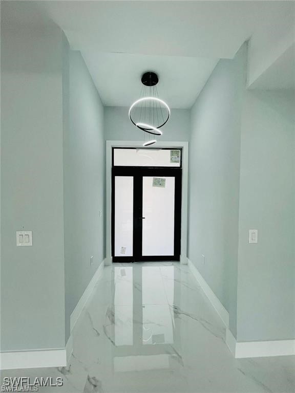 417 Progress Avenue Lehigh Acres, FL 33974 - Photo 5 of 25 a front view of a house