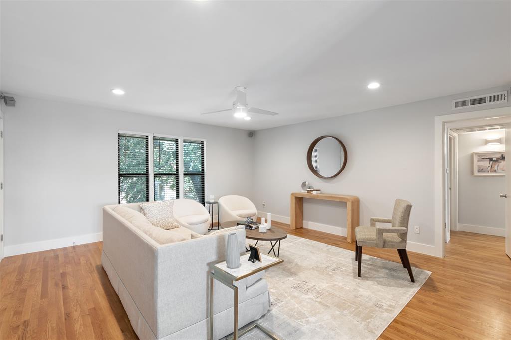 10727 Villager Road, Unit C Dallas, TX 75230 - Photo 9 of 39 Living area with ceiling fan, light wood-style floors, and recessed lighting
