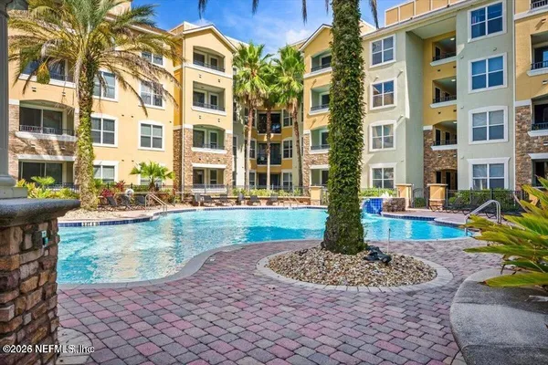a view of a swimming pool and a outdoor space