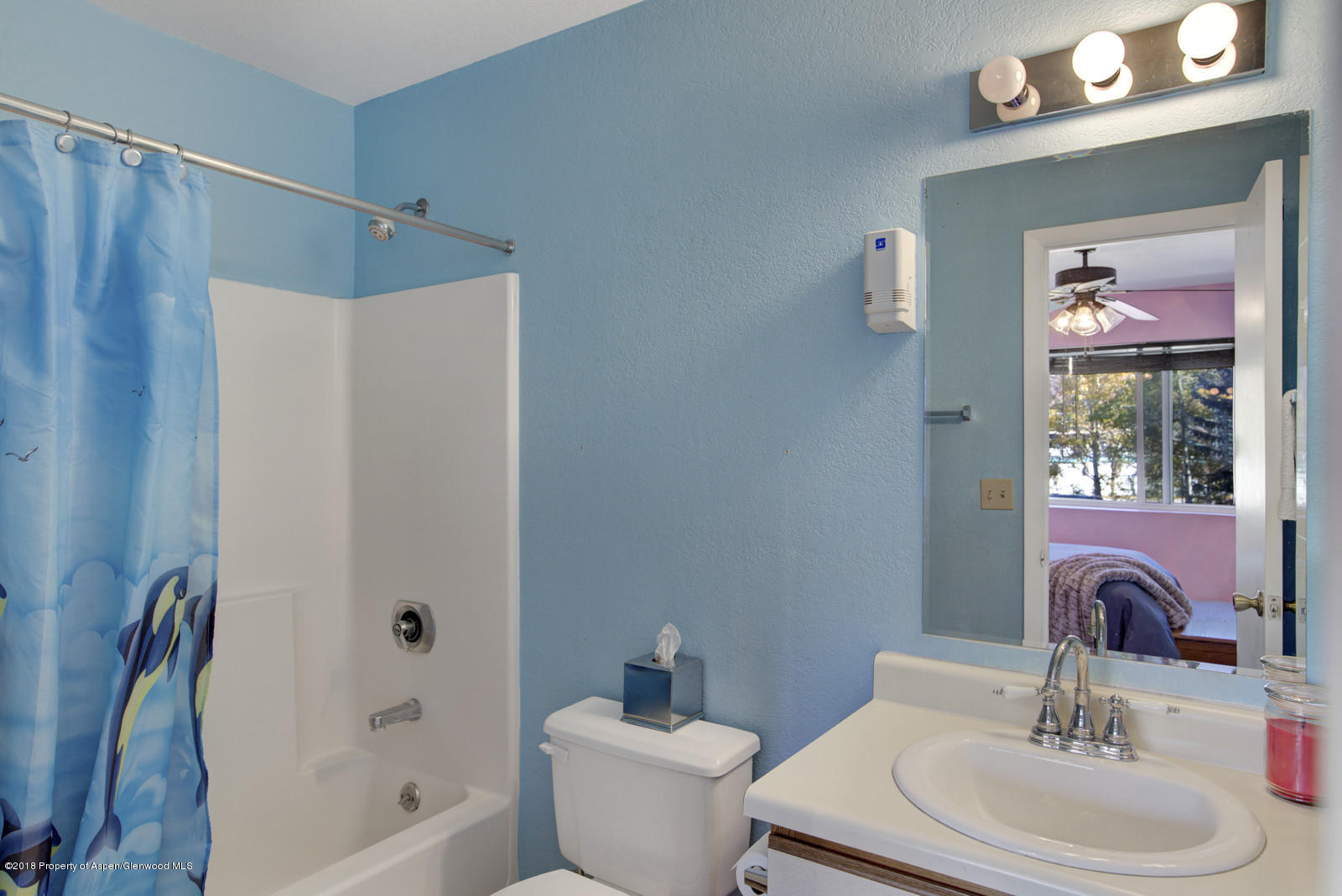 323 Park Avenue, Unit G2 Basalt, CO 81621 - Photo 14 of 16 a bathroom with a sink toilet and shower