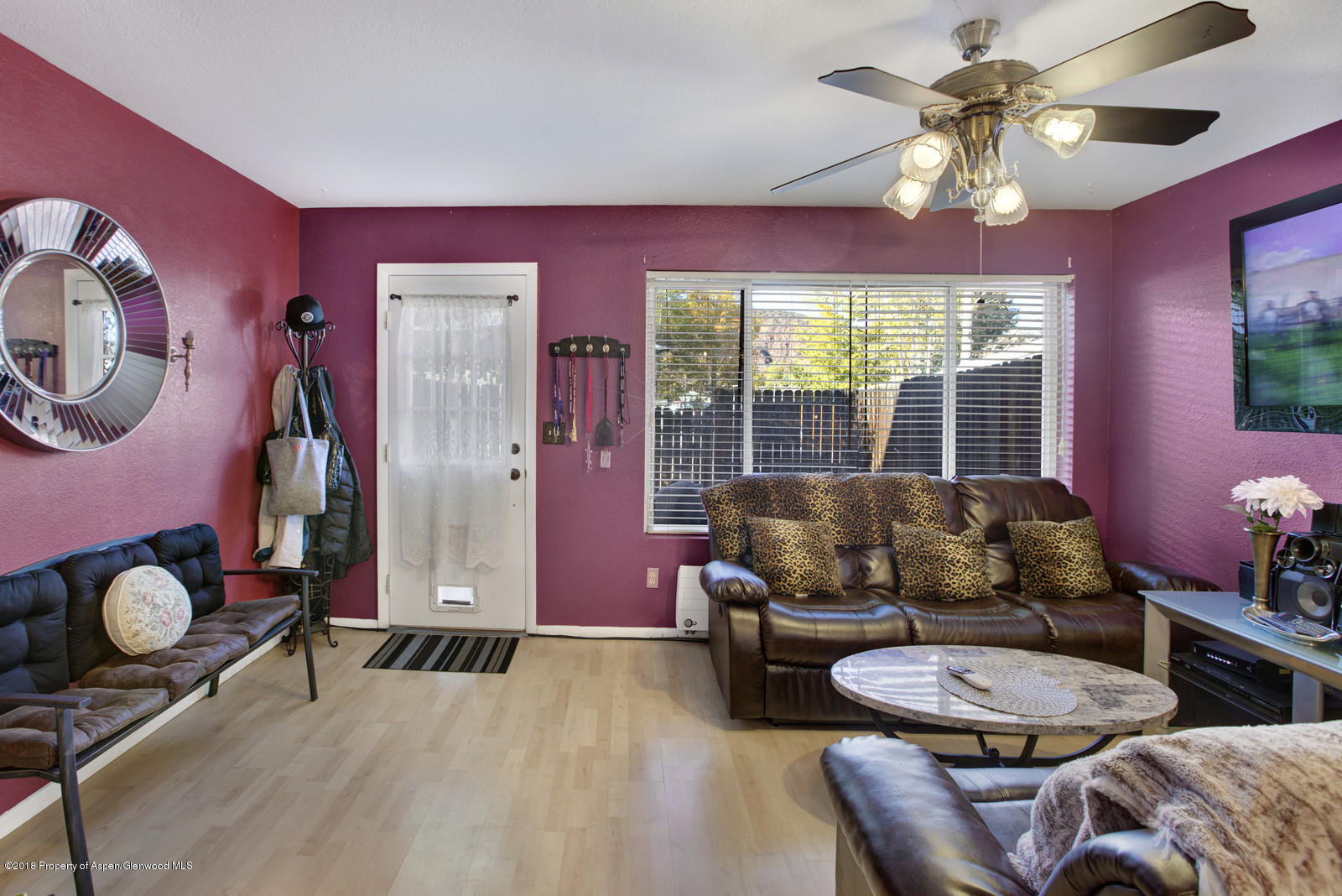 323 Park Avenue, Unit G2 Basalt, CO 81621 - Photo 2 of 16 a living room with furniture and a large window