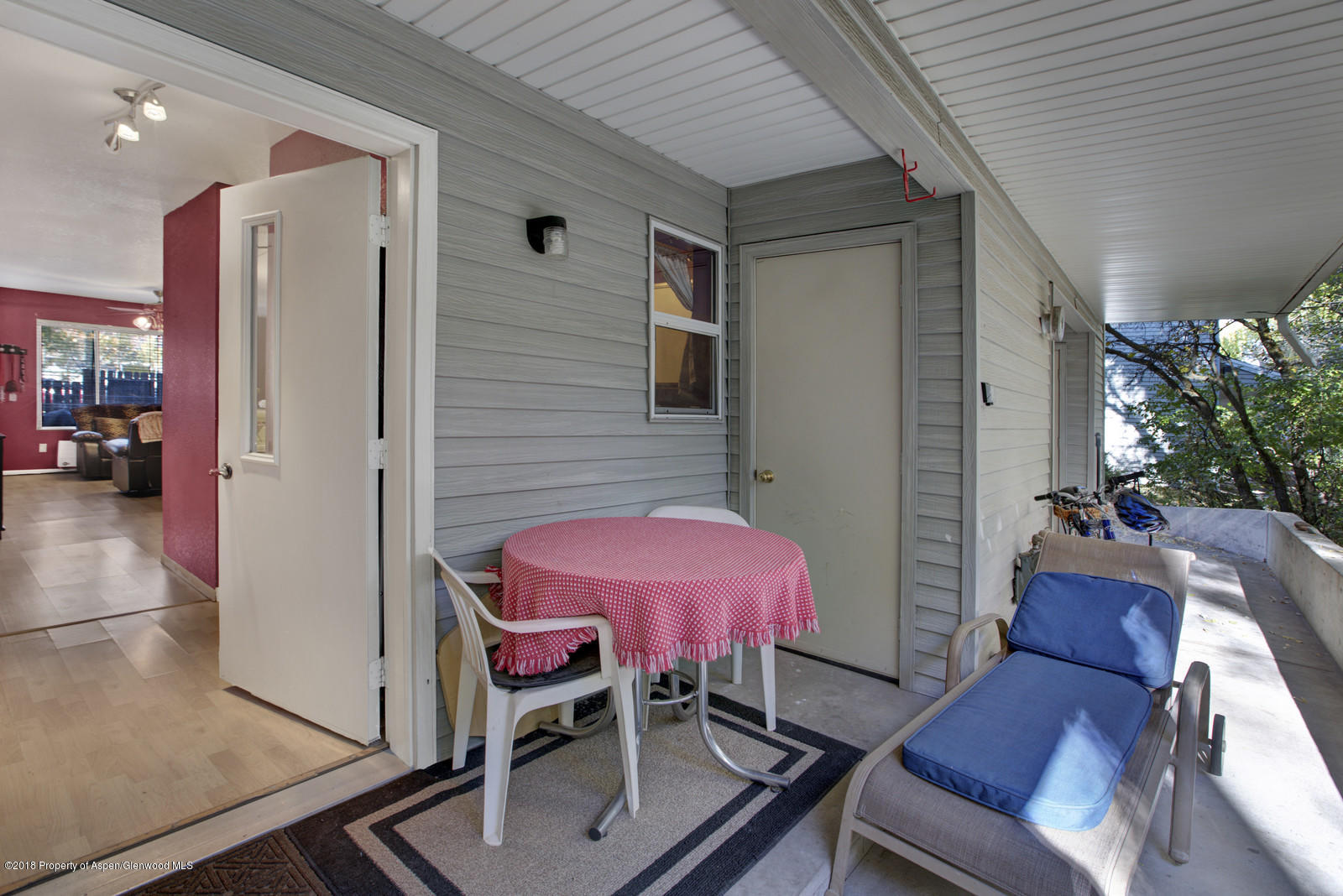 323 Park Avenue, Unit G2 Basalt, CO 81621 - Photo 8 of 16 a patio with table and chairs