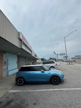 a car parked in front of a house