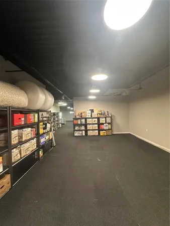 a room with furniture and a chandelier