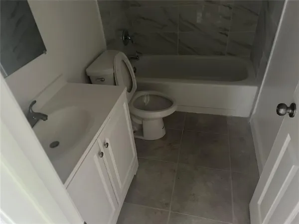 a bathroom with a sink and a toilet