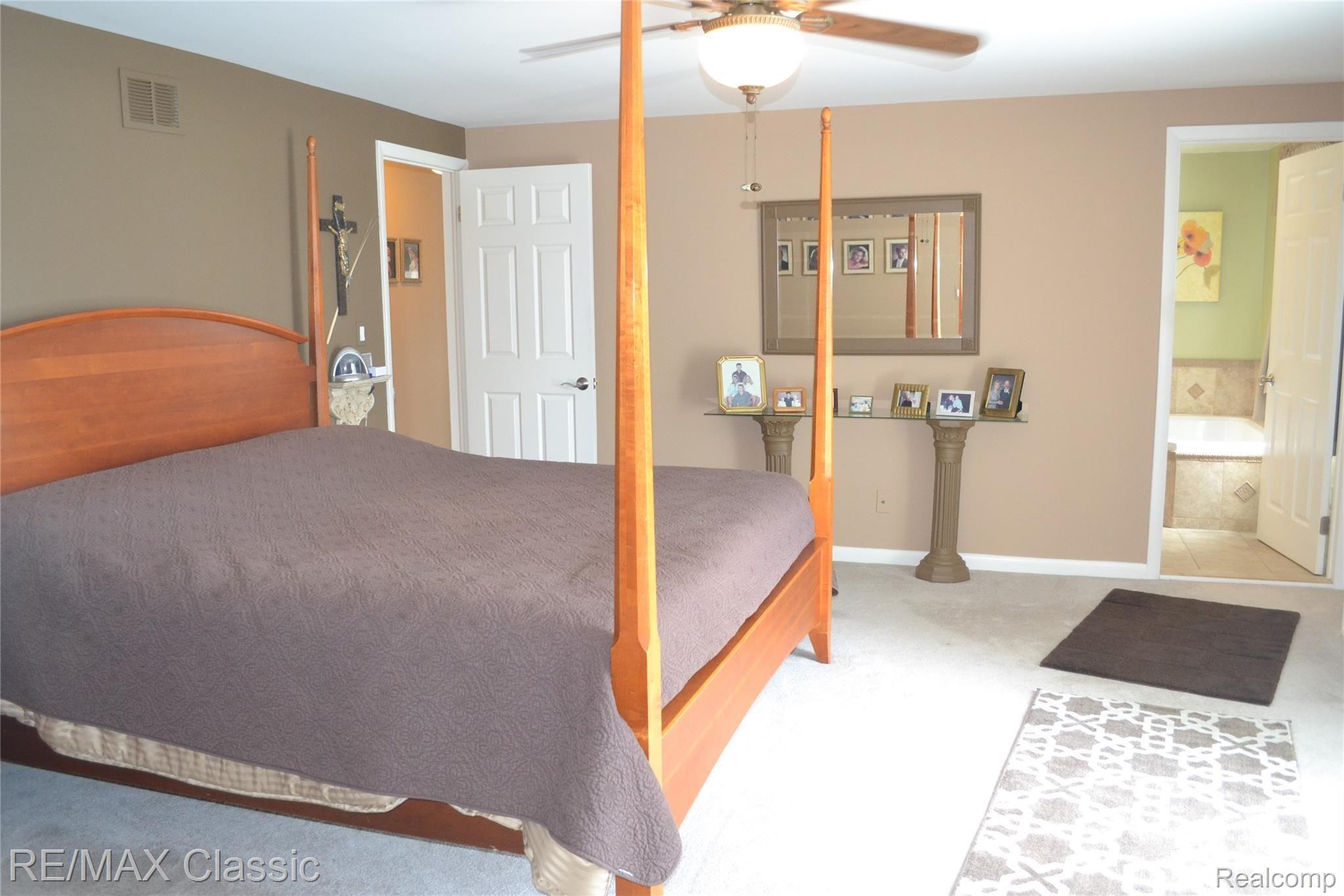 3901 East Commerce Road Commerce Township, MI 48382 - Photo 30 of 44 Master Bedroom