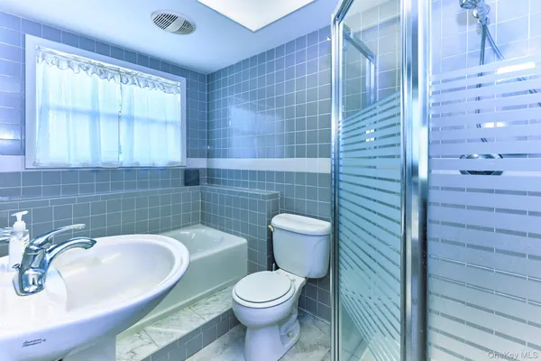 a close view of a bathtub in bathroom
