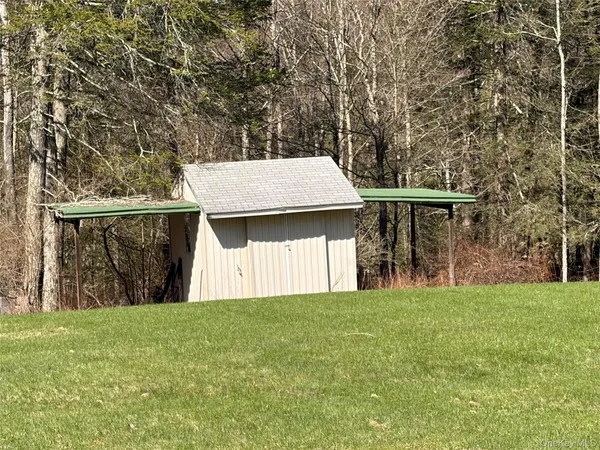 a view of swimming pool with a yard