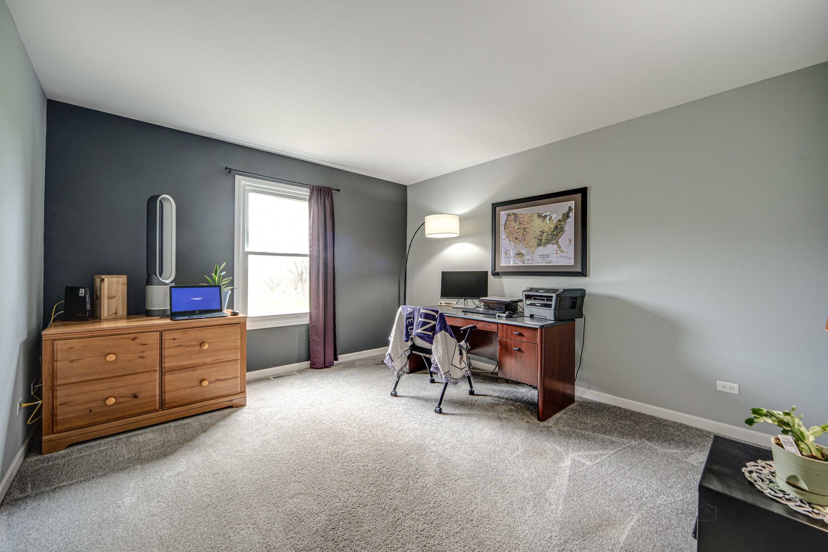 1603 Elm Street Spring Grove, IL 60081 - Photo 15 of 38 a living room with furniture and a dresser