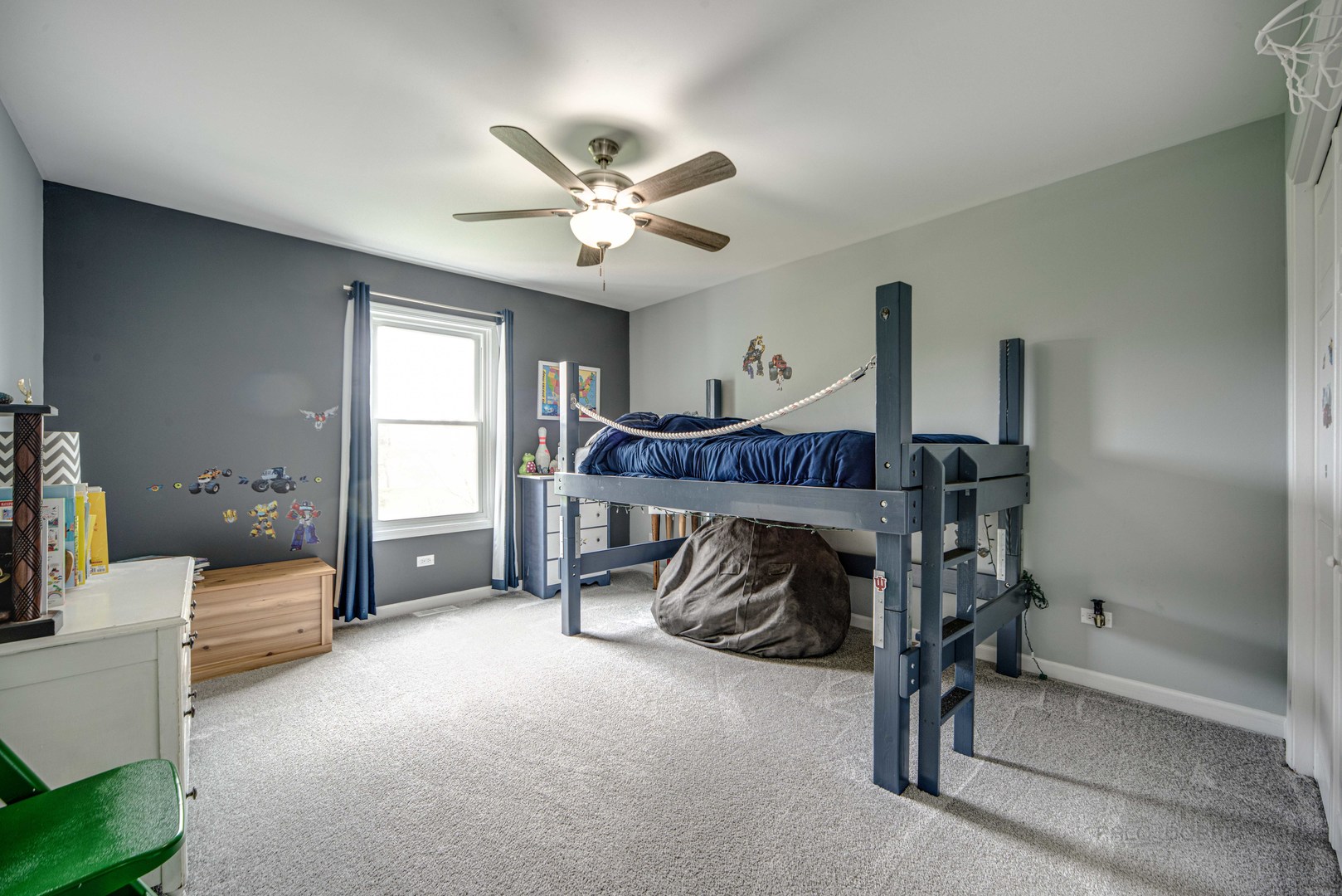 1603 Elm Street Spring Grove, IL 60081 - Photo 21 of 38 a bedroom with furniture and a chandelier