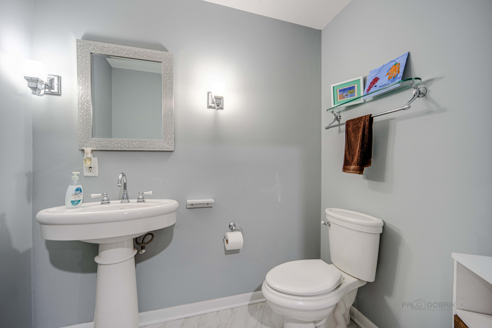 1603 Elm Street Spring Grove, IL 60081 - Photo 27 of 38 a bathroom with a sink toilet and a mirror