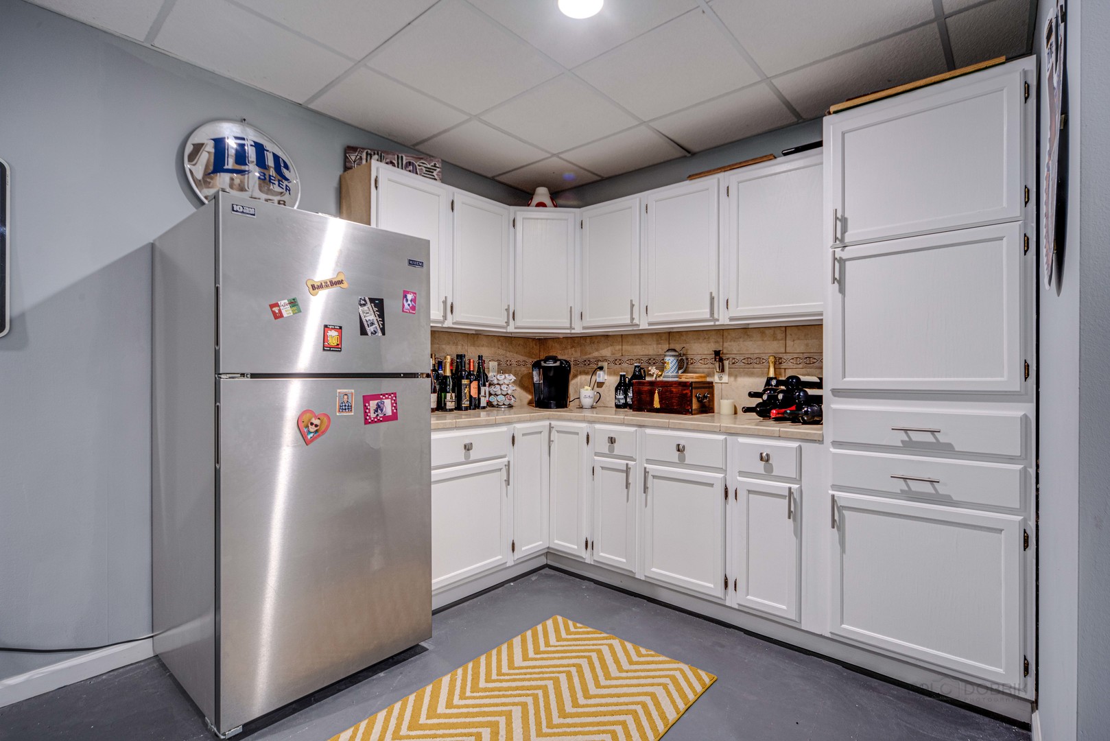 1603 Elm Street Spring Grove, IL 60081 - Photo 28 of 38 a kitchen with refrigerator and cabinets