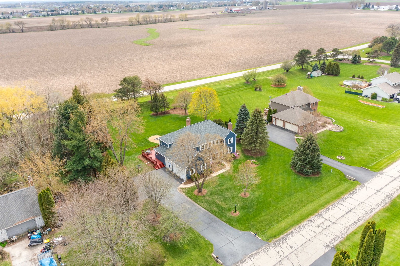 1603 Elm Street Spring Grove, IL 60081 - Photo 4 of 38 an aerial view of a house with a yard and lake view