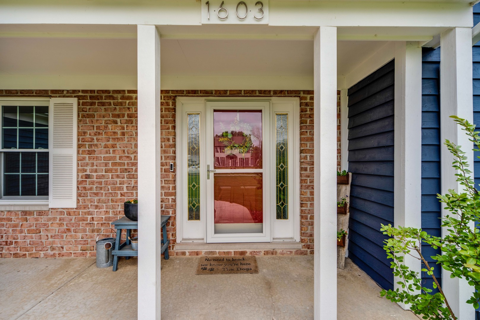 1603 Elm Street Spring Grove, IL 60081 - Photo 5 of 38 a view of a brick house with front door