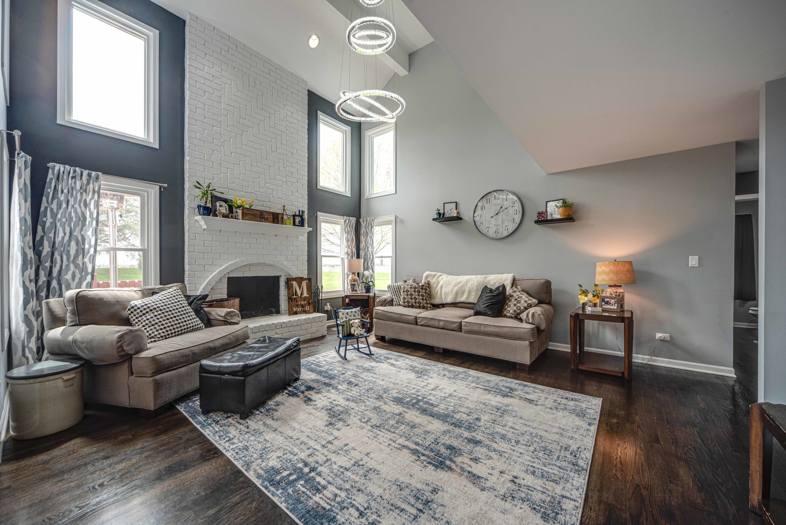 1603 Elm Street Spring Grove, IL 60081 - Photo 10 of 38 a living room with furniture wooden floor and a fireplace
