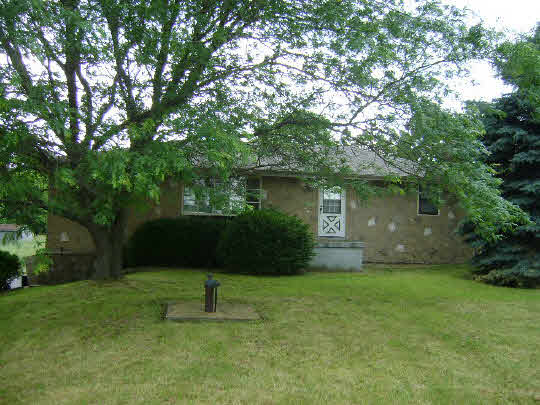 10142 South Center Road Durand, IL 61024 - Photo 1 of 11 a view of a garden with a tree