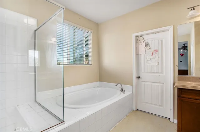 an aerial view of a house with a lake view