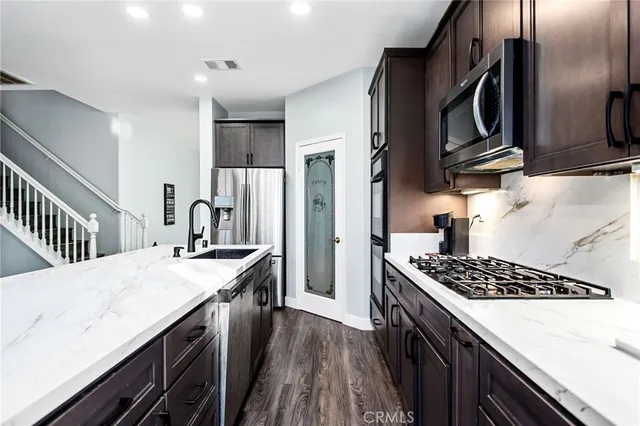 a living room with furniture fireplace and a flat screen tv