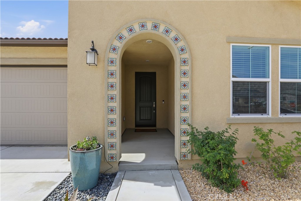 21159 Blue Jeans Court Riverside, CA 92507 - Photo 9 of 63 a view of a entryway door of the house