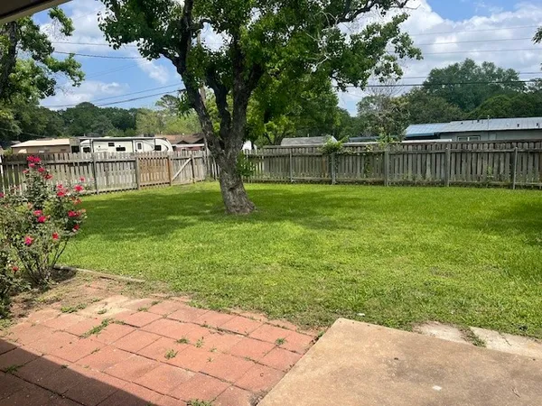 a view of a backyard with a garden