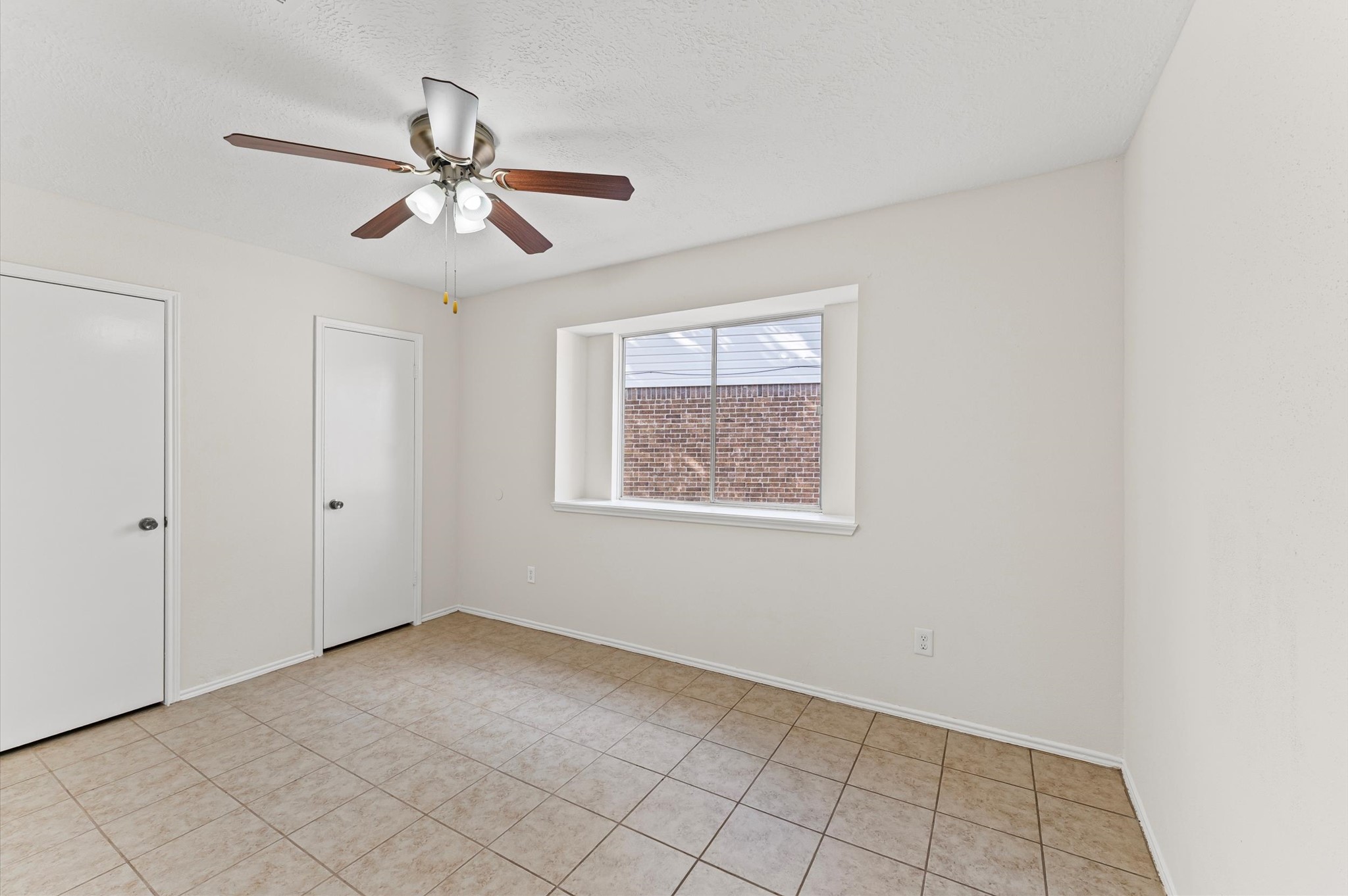 22935 Sherioaks Lane Spring, TX 77389 - Photo 11 of 22 a view of an empty room with a window