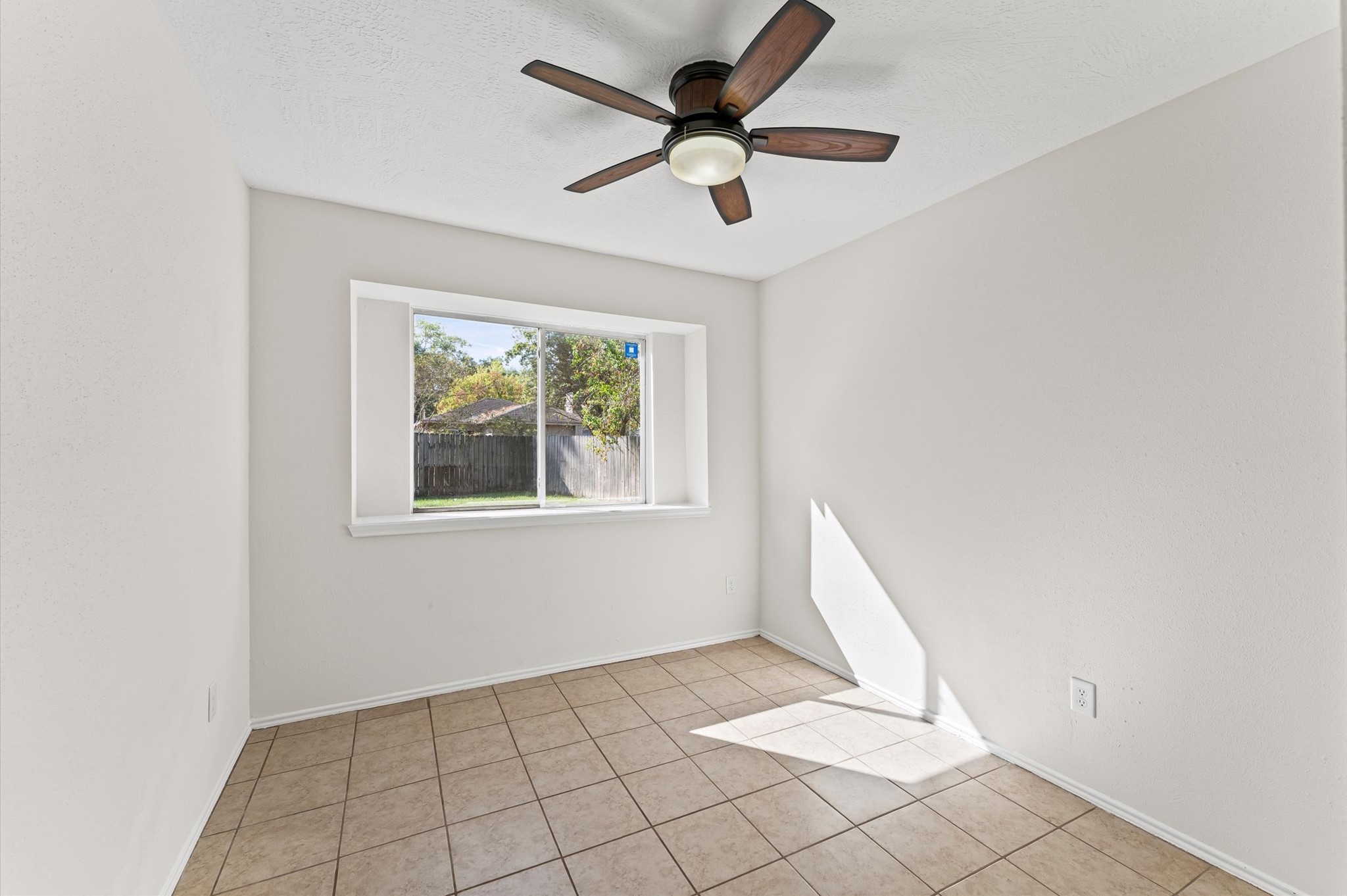 22935 Sherioaks Lane Spring, TX 77389 - Photo 13 of 22 a view of an empty room and window