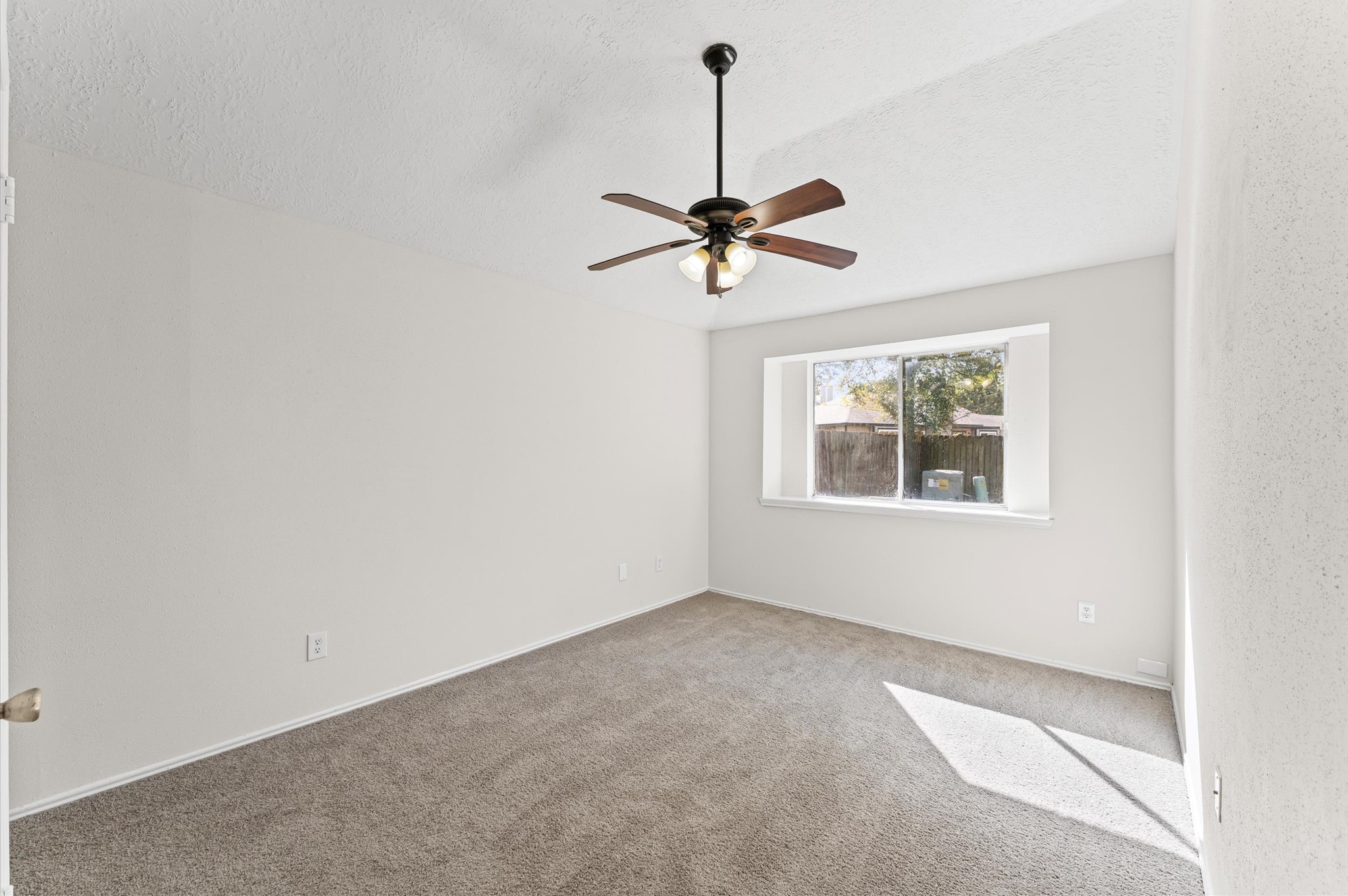 22935 Sherioaks Lane Spring, TX 77389 - Photo 15 of 22 a view of an empty room with a window