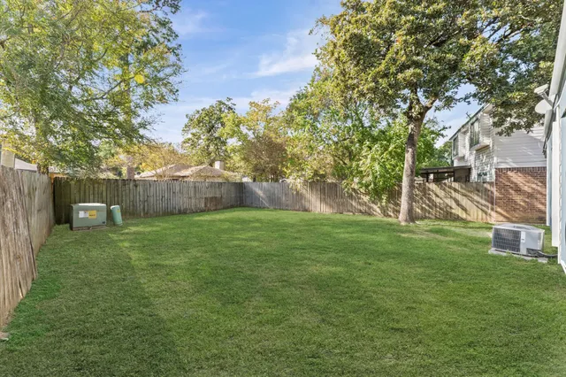 a view of a backyard with a garden