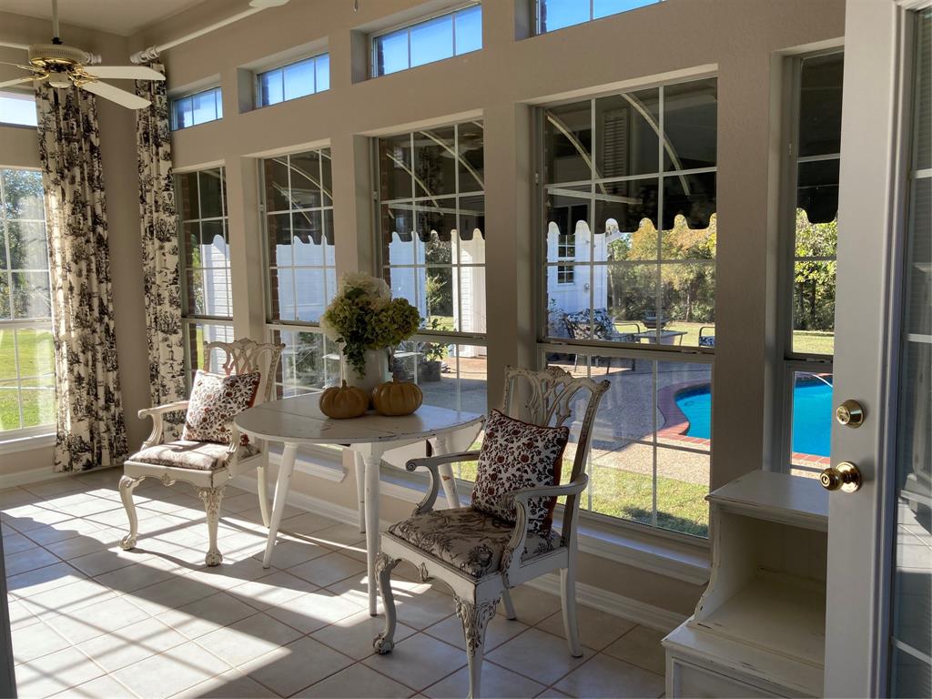 142 Hickory Valley Lane Waco, TX 76705 - Photo 14 of 33 a view of a dining room with furniture and chandelier