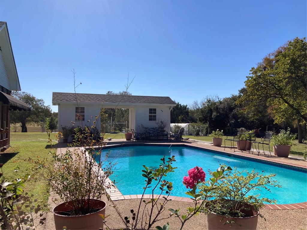 142 Hickory Valley Lane Waco, TX 76705 - Photo 26 of 33 a view of a house with swimming pool and sitting area