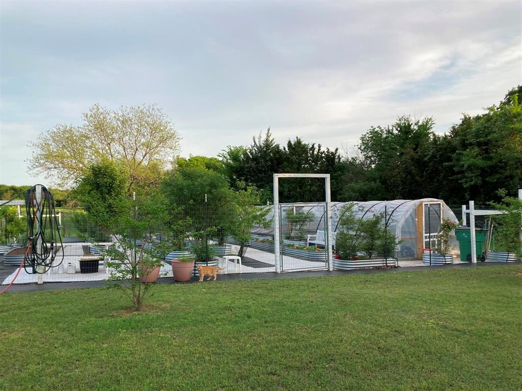 142 Hickory Valley Lane Waco, TX 76705 - Photo 27 of 33 a view of a garden with houses
