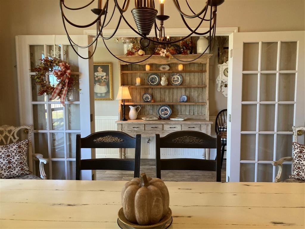 142 Hickory Valley Lane Waco, TX 76705 - Photo 7 of 33 a view of a chairs and a table in the patio