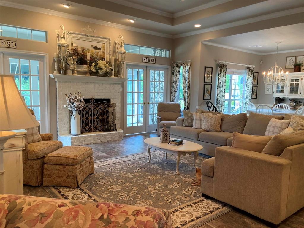 142 Hickory Valley Lane Waco, TX 76705 - Photo 8 of 33 a living room with furniture and a fireplace