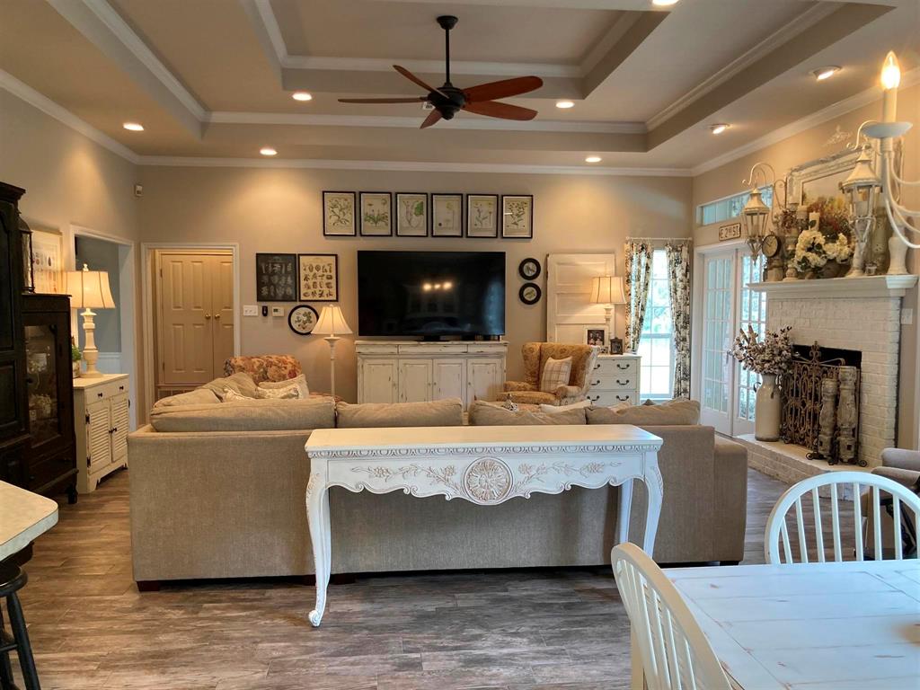 142 Hickory Valley Lane Waco, TX 76705 - Photo 9 of 33 a living room with fireplace furniture and a flat screen tv