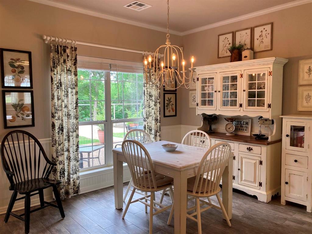 142 Hickory Valley Lane Waco, TX 76705 - Photo 10 of 33 a view of a dining room with furniture window and outside view