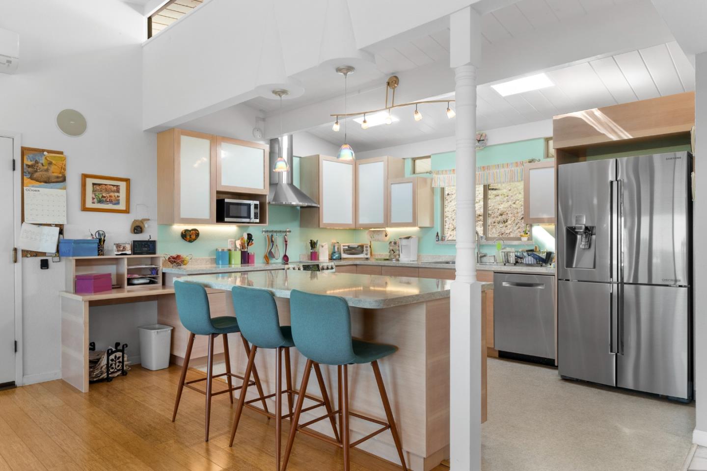 490 Amigo Road Soquel, CA 95073 - Photo 13 of 71 a kitchen with stainless steel appliances granite countertop a refrigerator and a stove top oven