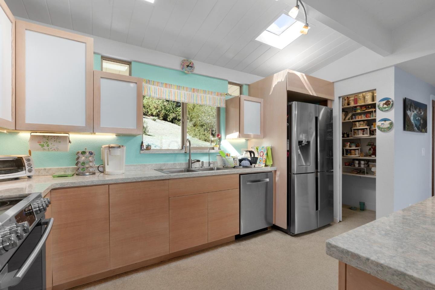 490 Amigo Road Soquel, CA 95073 - Photo 18 of 71 a kitchen with refrigerator and window