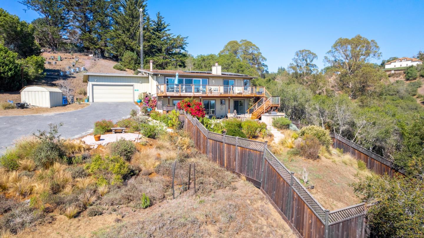 490 Amigo Road Soquel, CA 95073 - Photo 27 of 71 a view of a house with brick wall and sitting area